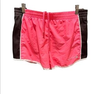 Pink shorts with white and black trim